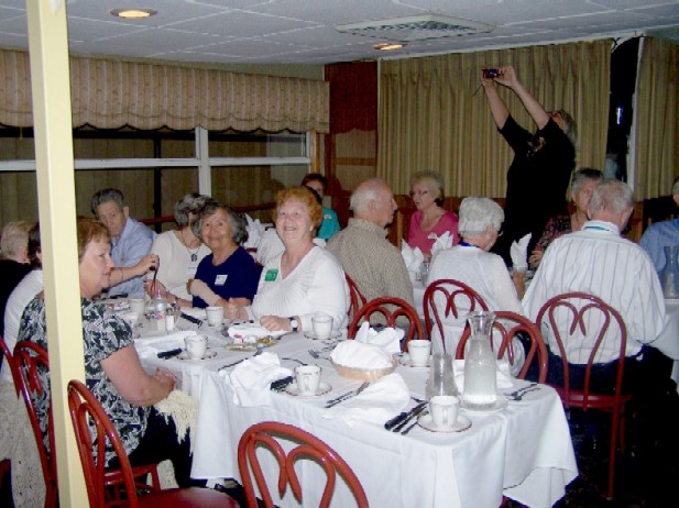 At the Farewell Dinner on the Riverboat Becky Thatcher